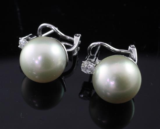 A pair of 18ct white gold, cultured pearl and single stone diamond earrings,